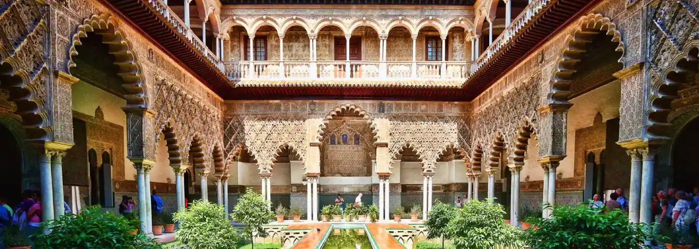 Intricate Moorish architecture of the Royal Alcázar palace in Seville.