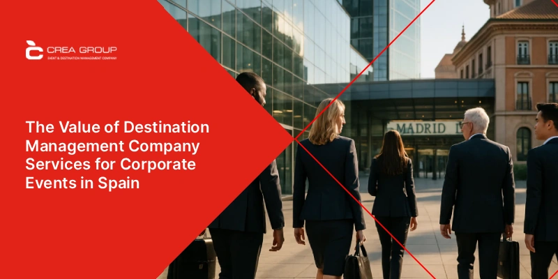 International corporate team arriving at a modern business venue in Madrid, Spain, representing destination management company services for corporate events, meetings, and incentives organized by CREA Group.