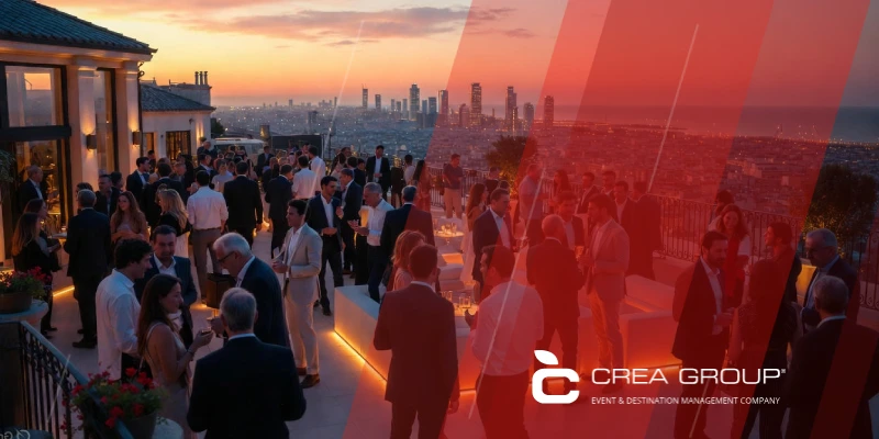Luxury corporate gala dinner organized by CREA Group Events at sunset in an exclusive glass palace in Madrid with international executives networking and the Royal Palace in the background, best event management company in Spain 2026